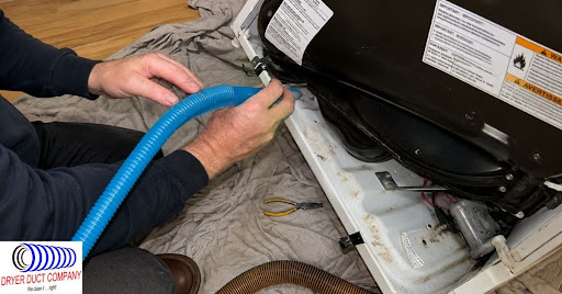 Long dryer vent duct filled with lint buildup restricting airflow and increasing fire risk inside a residential home